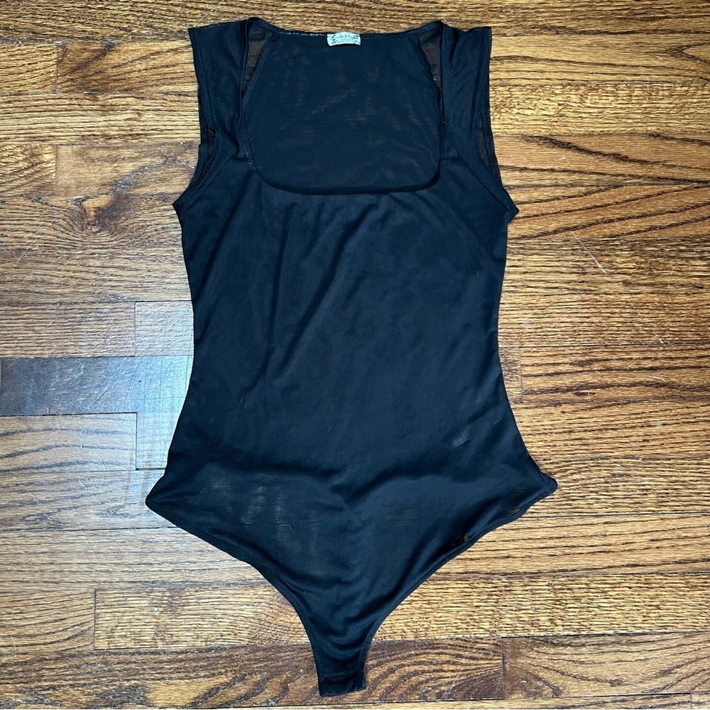 Free People Mesh Bodysuit Size Small excellent condition. Very stretchy soft